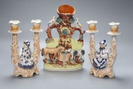 A Staffordshire flatback group of a horse and cow and a pair of novelty 19th century Continental