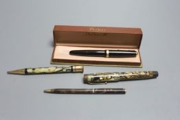 Two Parker fountain pens and two pencils