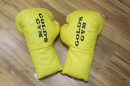 Golds Gym. A pair of oversized boxing gloves, length 58cm