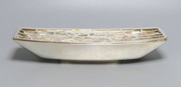 A. G. Styles for Garrard & Co, an unusual silver boat-shaped presentation flower trough, having