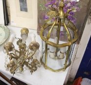 An early 20th century gilt brass hall lantern, height 49cm, and a gilt metal lustre hung