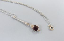 A 1920's white metal, hessonite garnet and diamond set drop pendant necklace, pendant 44mm, chain