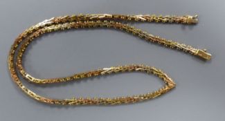 A modern three colour 9ct gold necklace, approx. 39cm, 13.8 grams.