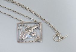 A Georg Jensen sterling twin leaping dolphin with frond rectangular pendant necklace, no. 94,