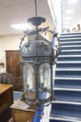 A late 19th /early 20th century wrought iron exterior lantern, height 148cm