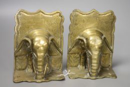 A decorative pair of early/mid 20th century Chinese brass bookends in the form of elephants,