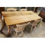 A pine 'farmhouse' kitchen table, length 183cm, depth 87cm, height 78cm fitted single end drawer and