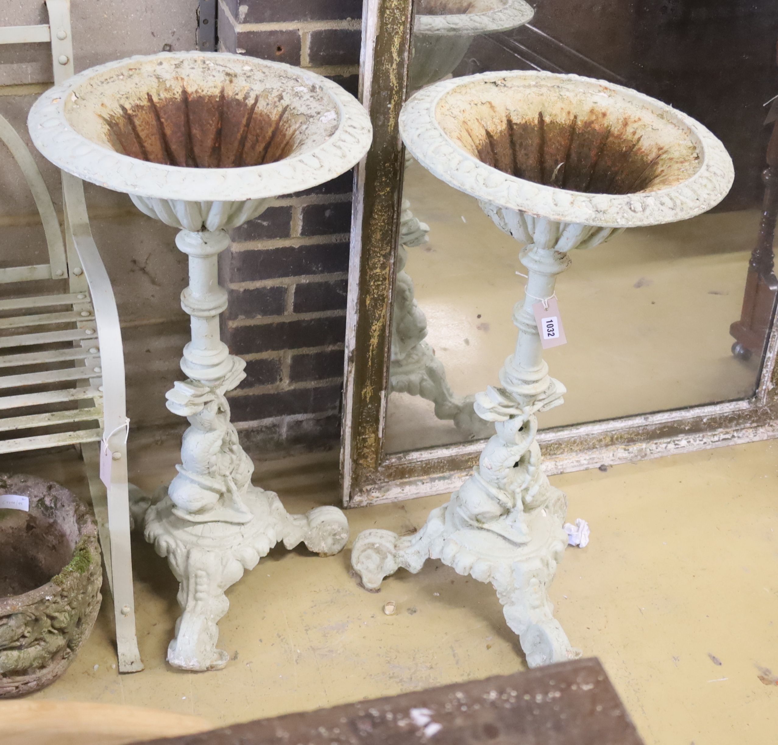 A pair of Victorian Coalbrookdale style painted cast iron pedestal urns, diameter 46cm, height 84cm