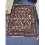 A Bakhtiari Boteh rug, 210 x 160cmCONDITION: Has age and is worn, some fraying and areas of low