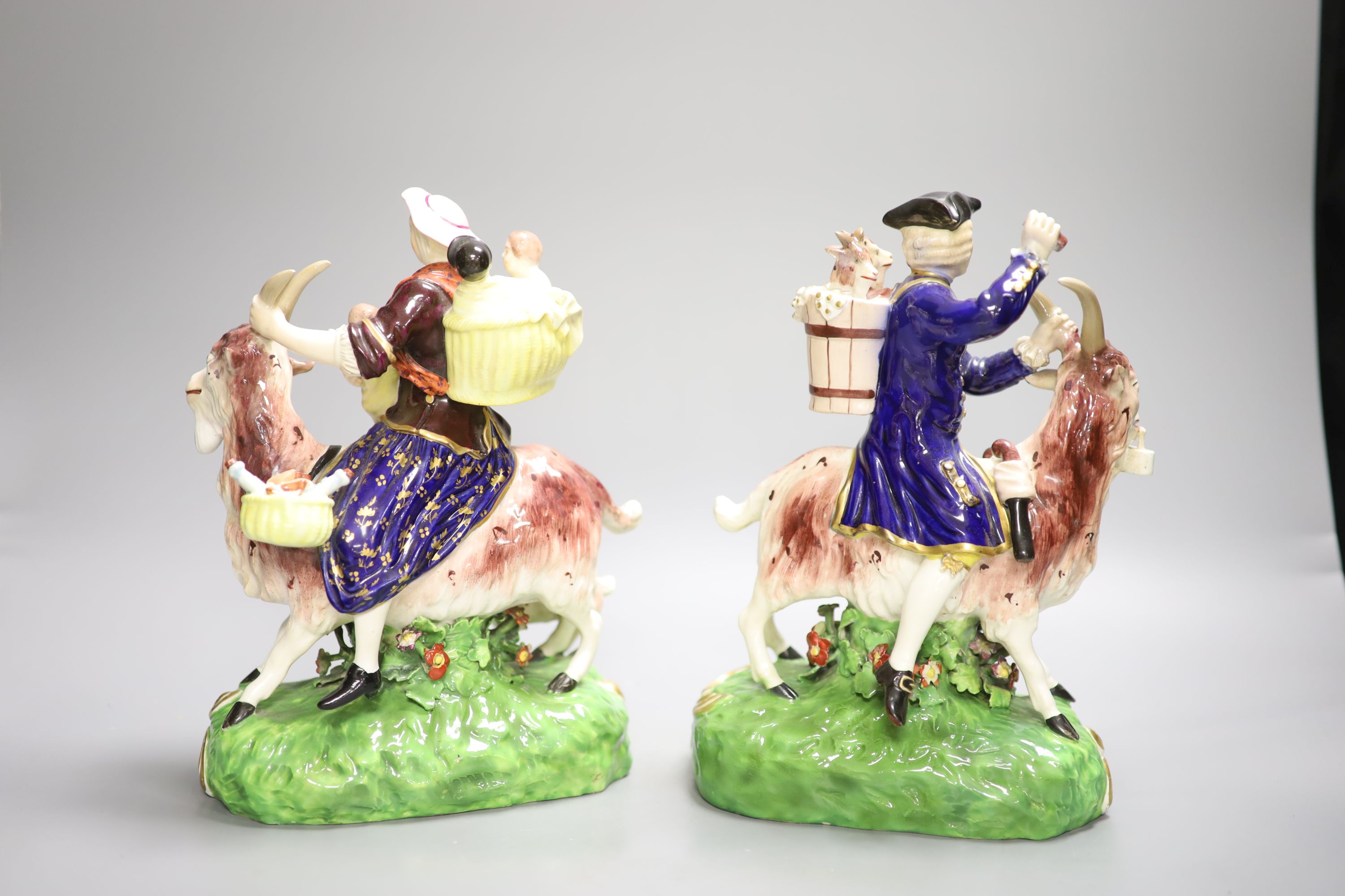 A pair of Derby figures, Welsh Tailor and Companion figures both figures seated on a goat, the - Image 2 of 4