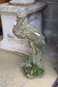 A reconstituted stone pelican garden ornament, height 53cm