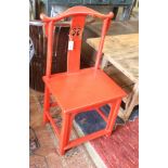 A Chinese red lacquer side chair