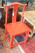 A Chinese red lacquer side chair