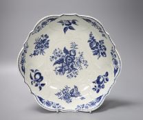 A Worcester salad bowl printed on the inside in underglaze blue with flowers, pomegranate and fir