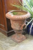 A Victorian terracotta campana garden urn on stand, diameter 48cm, height 58cm