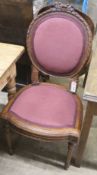 A pair of Louis XVI style walnut hall chairs