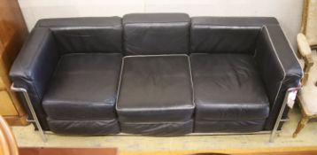 A Harrods Corbusier style chrome and black leather three seater settee, length 180cm, depth 69cm,