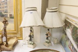 A pair of earthenware Blackamoor table lamps, height 45cm incl. shade