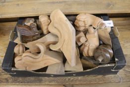 A collection of carved wooden furniture feet