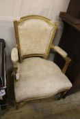 A 19th century French giltwood fauteuil, width 65cm, depth 60cm, height 94cm