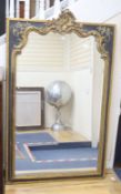 A Victorian style rectangular parcel gilt wall mirror, width 103cm, height 170cm