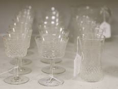 A part suite of 1930's table glass, comprising a water jug, four tumblers, six red wines and seven
