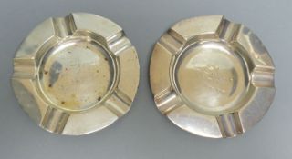 A pair of George V silver ashtrays, 11.5cm, 4.5 oz.