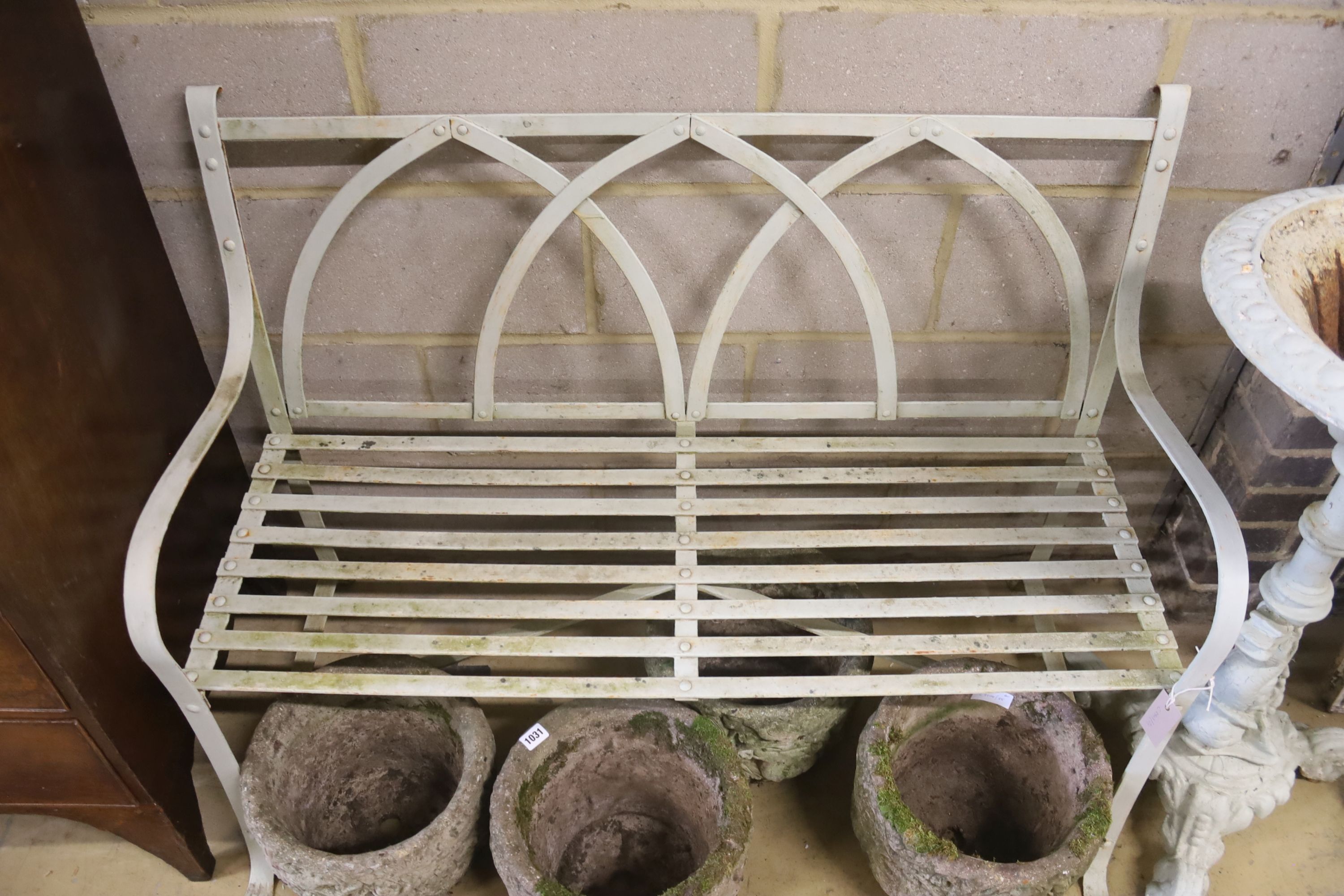 A 19th century painted wrought iron garden bench, length 112cm, depth 52cm, height 85cm