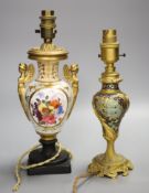 A Rococo revival champleve and ormolu converted table lamp, together with a floral painted porcelain