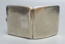 A George V engine turned silver cigarette case, Mappin & Webb, Birmingham, 1911, 89mm, gross 3.5oz.