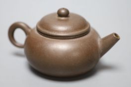 A Chinese Yixing tea pot, with signature on baseCONDITION: Inside rim to lid is chipped