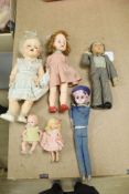 A Deans rag book 'Lupino Lane The Lambeth Walk', a doll wax sailor doll, pedigree and three others