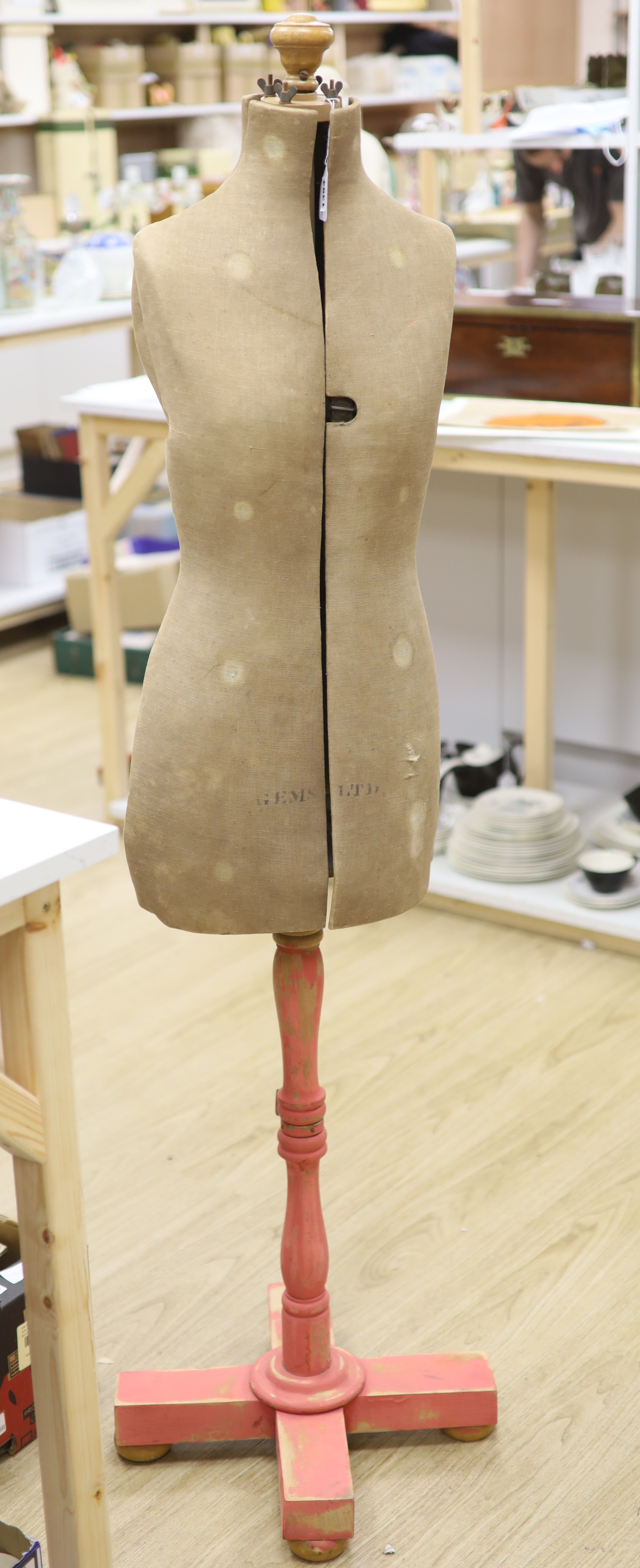 An expandable cloth tailor's dummy on wooden base, height 155cm
