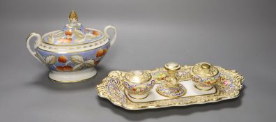 A Copeland and Garrett inkstand with fixed pots and candlestick and two covers, painted with