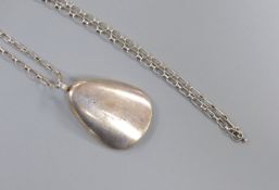 A 1960's Nanna & Jorgen Ditzel for Georg Jensen sterling oyster shell pendant, 60mm, design no