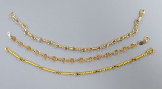Three assorted modern 9ct gold bracelets, longest 19cm, 17.4 grams.