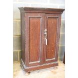 A small late Victorian mahogany two door cabinet, width 47cm, depth 26cm, height 76cm