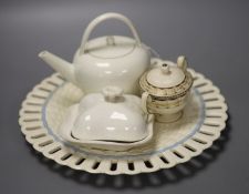 Four pieces of 19th century Wedgwood Queensware; a teapot, dish and cover and pot and cover together