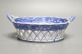 An English pottery basket printed in under glaze blue with stylised motifs probably Spode, length