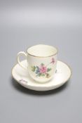 A large Derby coffee or chocolate cup and saucer painted with sprays of flowers by Wm.