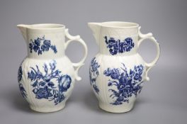 A Caughley mask jug printed with floral sprays and a Worcester mask jug, printed with Natural