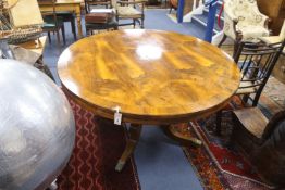 A Regency inlaid rosewood circular tilt top breakfast table, diameter 130cm, height 75cm