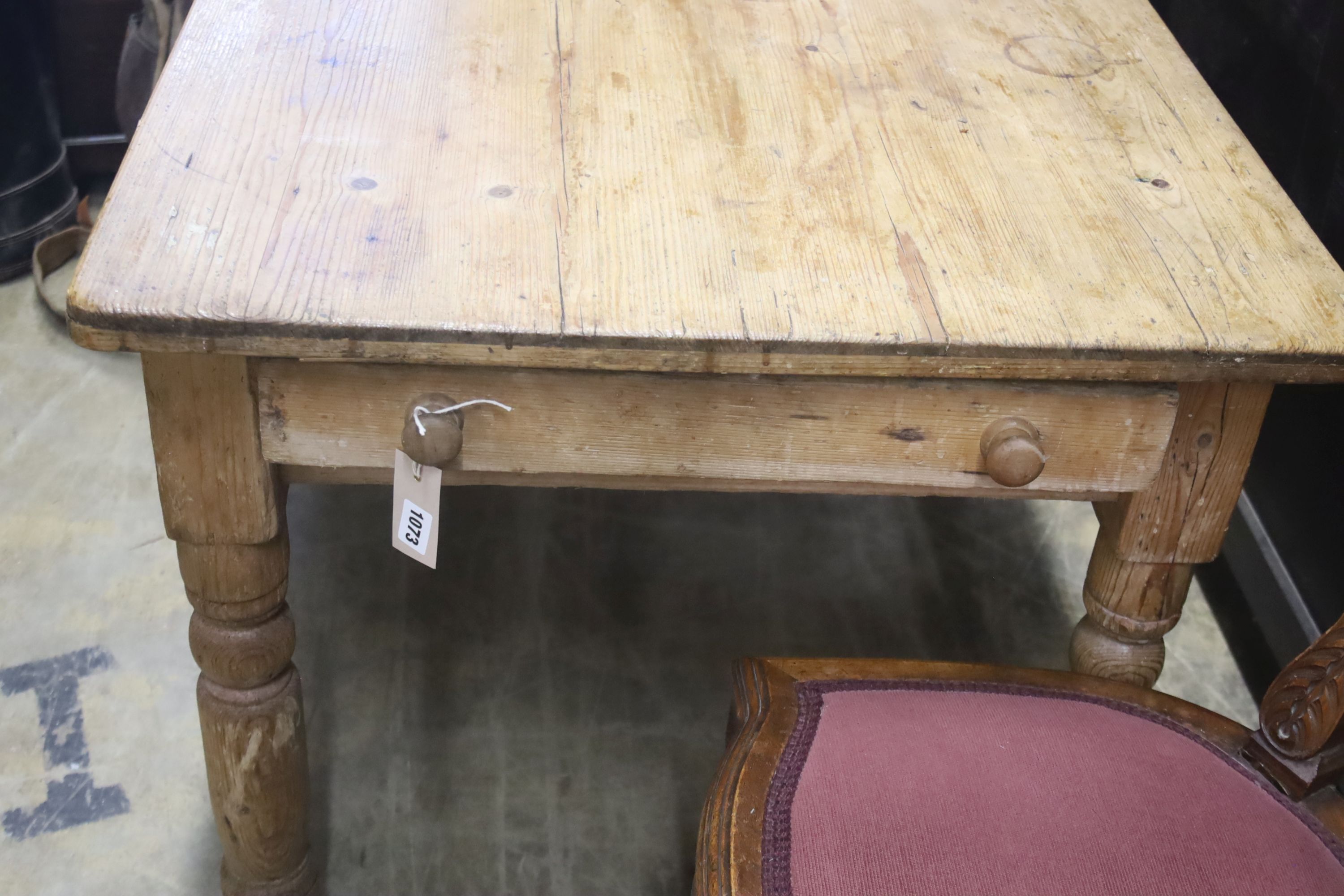 A rectangular pine kitchen table, length 112cm, depth 75cm, height 72cm - Image 2 of 3