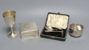 A sterling goblet, silver cigarette box, small beaker and cased spoon & pusher.