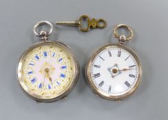 Two engraved silver open face pocket watches, one keywind with white enamelled Roman dial, blue