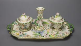 An English porcelain inkstand, of Coalbrookdale type painted and encrusted with flowers c.1830,