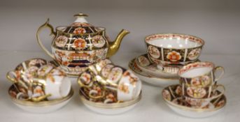 A Spode part tea service painted in imari style with pattern 1956, consisting of a teapot cover
