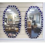 A pair of Irish style shaped oval wall mirrors, width 40cm, height 70cm