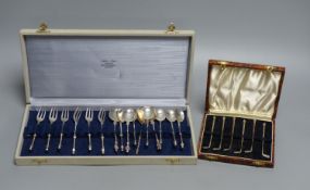 Two cased sets- Dutch white metal spoons & forks and a set of six sterling 'golf club' cocktail