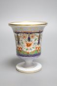 A Spode beaded vase decorated in stylised oriental style between two light blue and gilt borders,